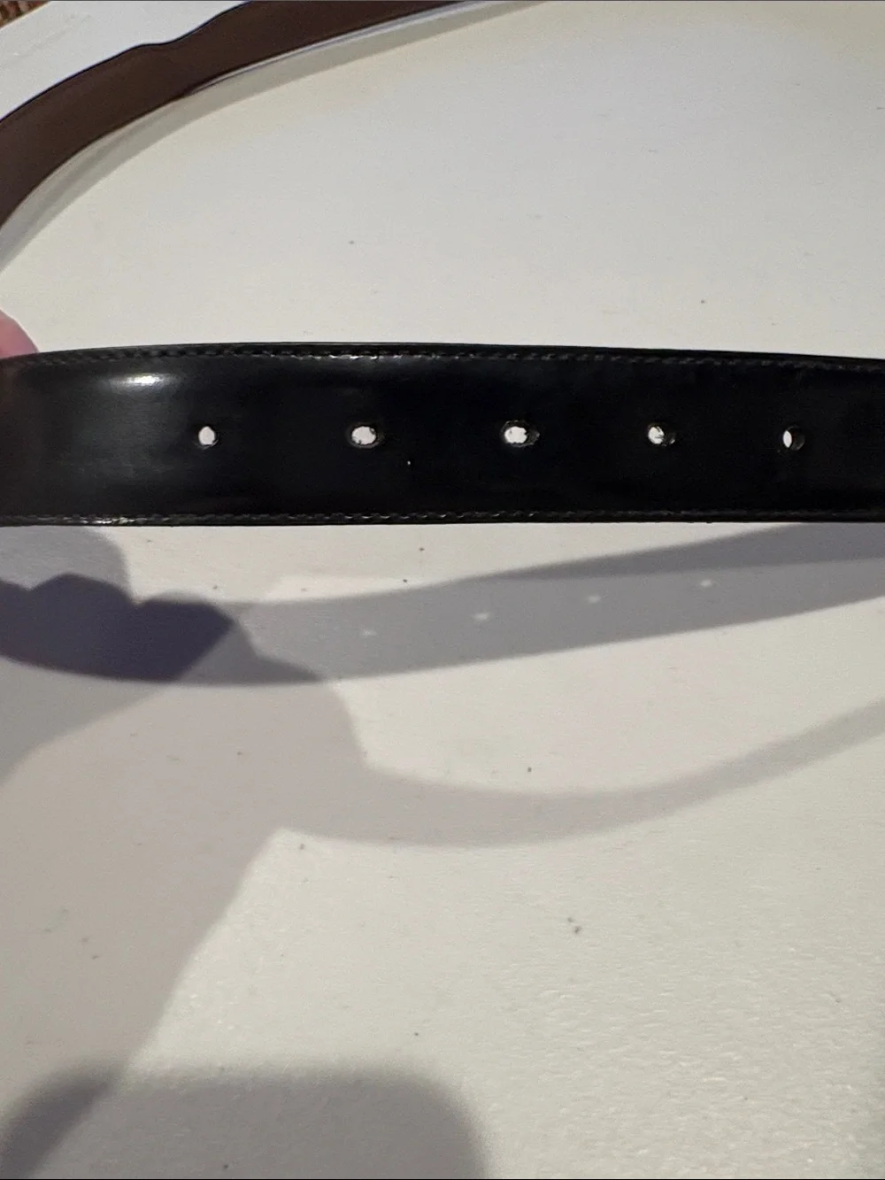 Salvatore Ferragamo Leather Gancini Belt with Silver Buckle. Size 42 black/brown